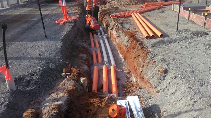 Combined service route conduit installation
