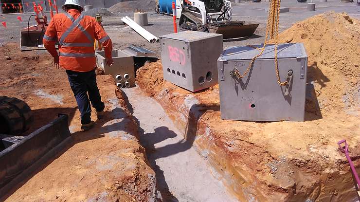 Combined service route pit installation