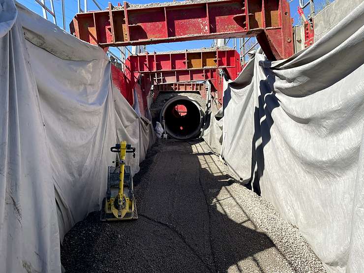 Shored trench, compacted bedding ready for RCP