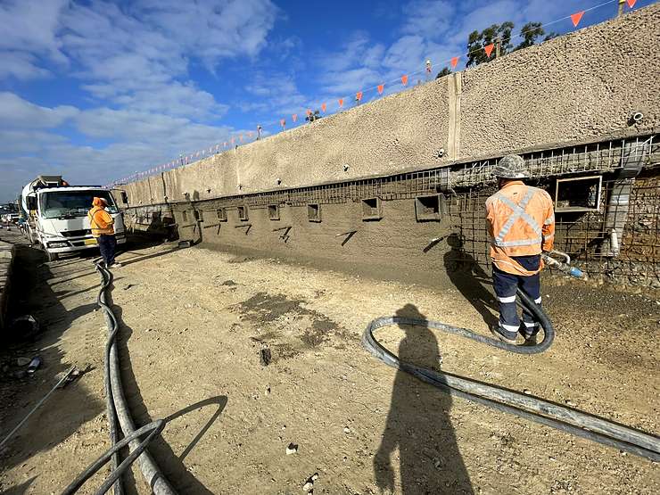 Shotcrete application to retaining wall